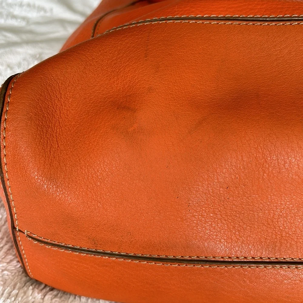 Large leather Cole Haan orange shoulder bag with silver hardware buckles. - Picture 10 of 16